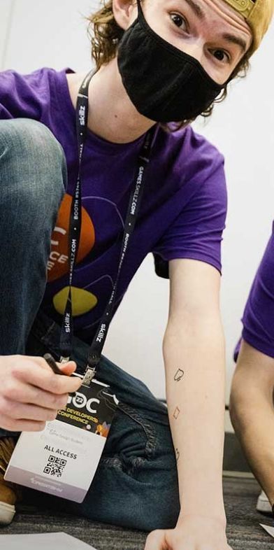 People working on solving puzzle