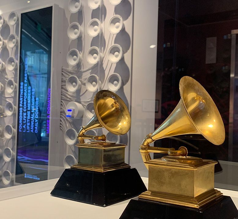 Grammy with donor wall in background